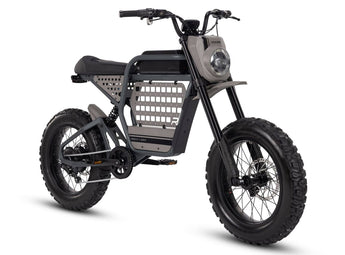 A black Ride1Up Revv1 DRT electric bike with off-road tires and a basket in the front.