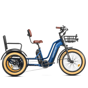 A blue and black GREATTAN electric trike with a passenger seat, front basket, and integrated lights. The trike features a single chainring and is designed for adults.